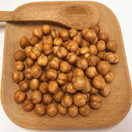 Ντυμένα ψημένα τηγανισμένα Chickpeas με πλήρη θρεπτικό βιταμινών μαζεύουν με το χέρι